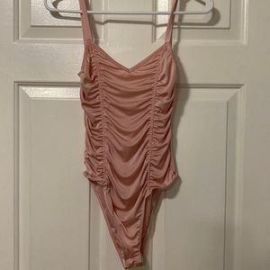 Pink bodysuit